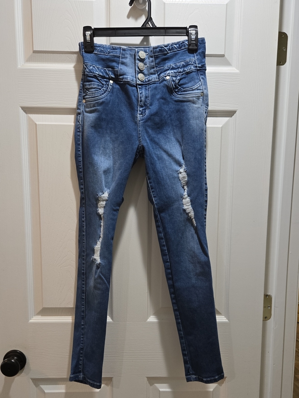 Nicolette Shapewear Distressed High-Waist Skinny Jeans in Blue. Size 12.
